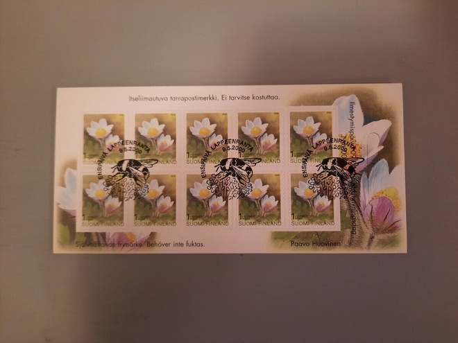 //2000 Kukkamerkki    leimattu, kannet mukana