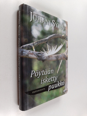 Juhani (toim.) Syrjä : Pöytään isketty puukko : erätarinoita