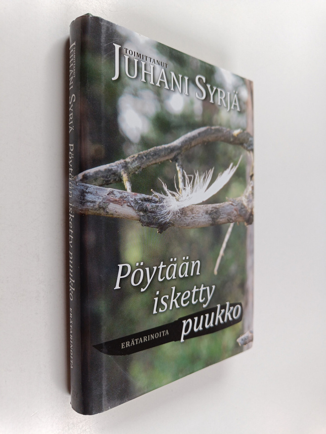 Juhani (toim.) Syrjä : Pöytään isketty puukko : erätarinoita