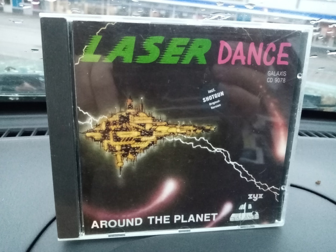 CD LASERDANCE : AROUND THE PLANET ( SIS POSTIKULU)