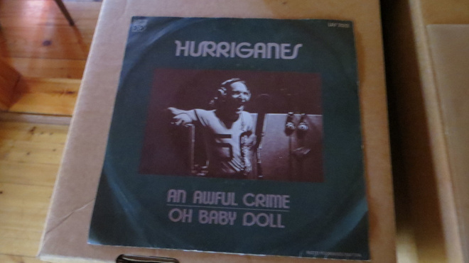 hurriganes single: an awful crime/oh baby doll 1976 lrs 2123