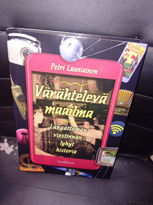 Launiainen : Värähtelevä maailma ( SIS POSTIKULU )