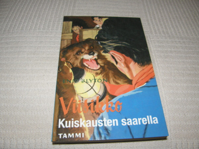Enid Blyton Viisikko Kuiskausten saarella  -nid