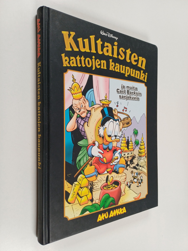 Kultaisten kattojen kaupunki ja muita Carl Barksin sarjak...