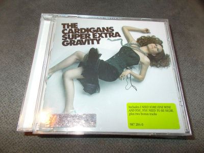 CD THE CARDIGANS ** SUPER EXTRA GRAVITY **