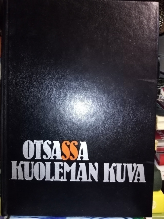 Korjus :  Otsassa kuoleman kuva