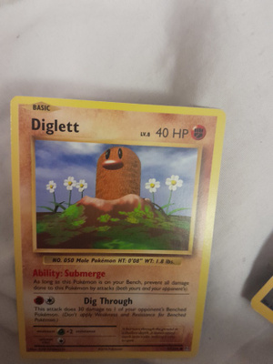 Diglett - 55/108 - Common - XY Evolutions card