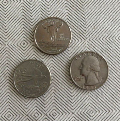 KOLME ERILAISTA USA:N NELJÄNNESDOLLARIA -EI HV-