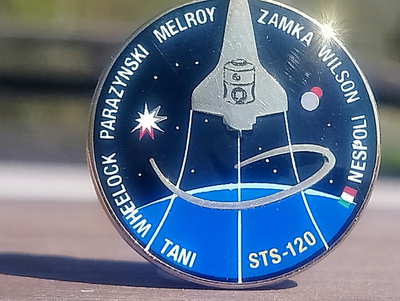 NASA merkki. Halkaisija - 26 mm. Leimalla STS 120 NASA. Ehjä