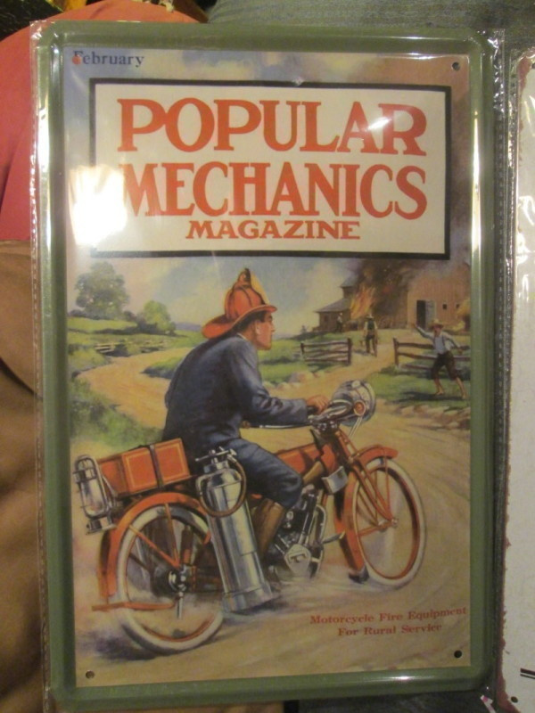 Peltikyltti Popular Mechanics. Moottoripyörä palovarustein