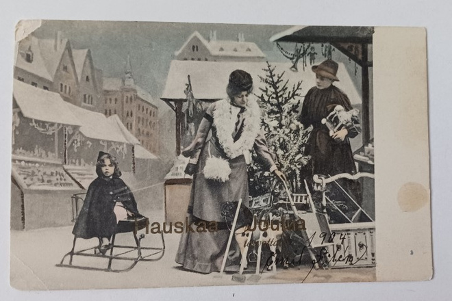 Perhe ostamassa joulukuusta ja lahjoja, p. 1904
