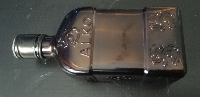 Wanha Alkon Whisky pullo Leijonilla