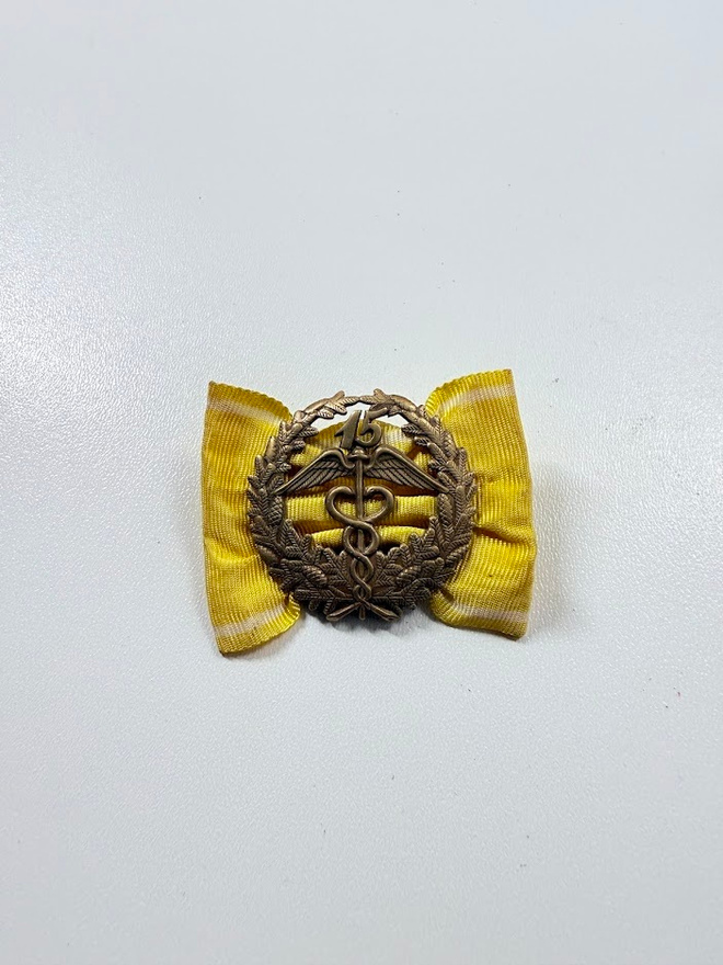 KESKUSKAUPPAKAMARIN ANSIOMERKKI