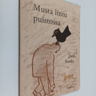 Jussi Rusko : Musta lintu puistossa : runoja (signeerattu... - pikkukuva 1