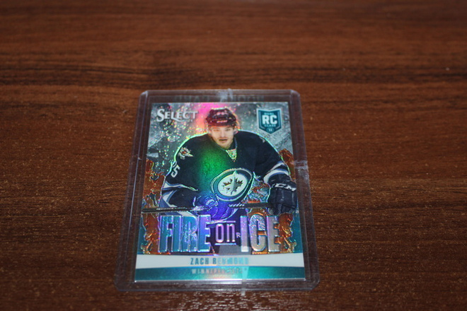 2013-14 Panini Select Hockey Blue Fire On Ice RC PRIZM /25