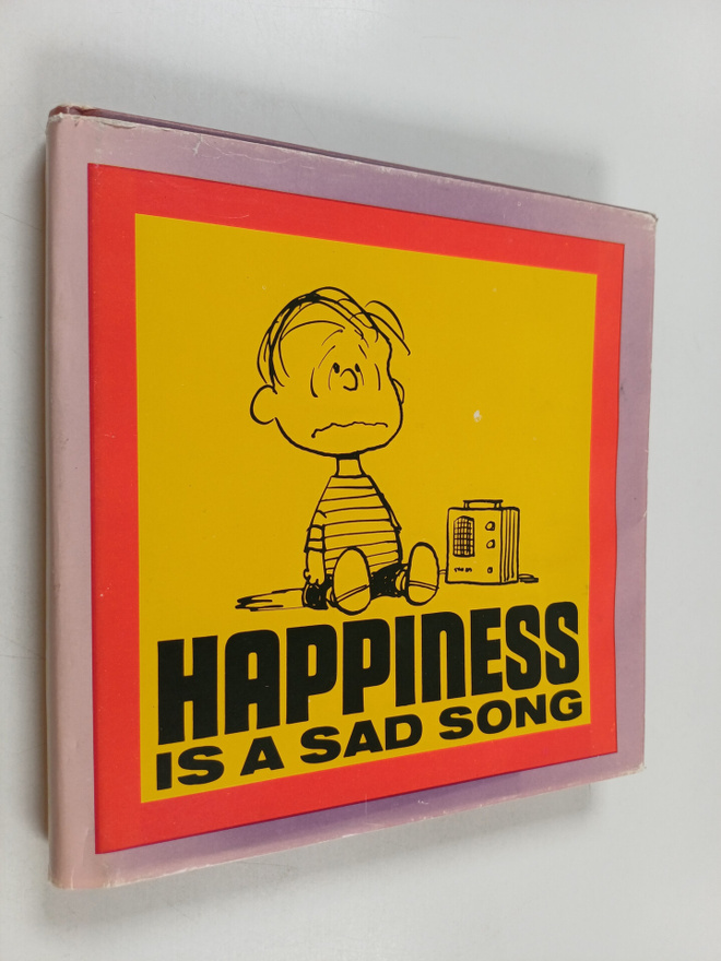 Charles M. Schulz : Happiness is a Sad Song