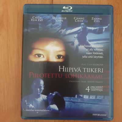 Hiipivä tiikeri piilotettu lohikäärme