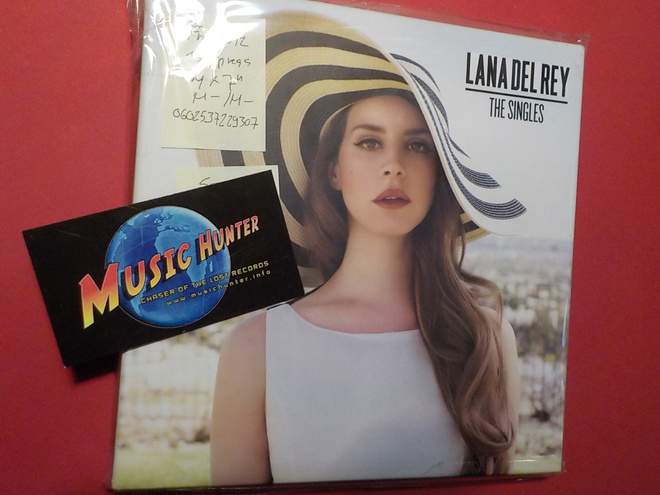 LANA DEL REY - THE SINGLES M-/M- 4x 7'' SINGLE BOKSI