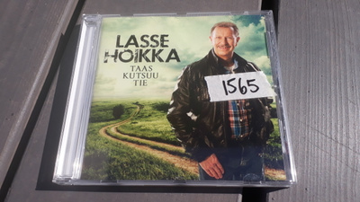 Lasse Hoikka : Taas kutsuu tie
