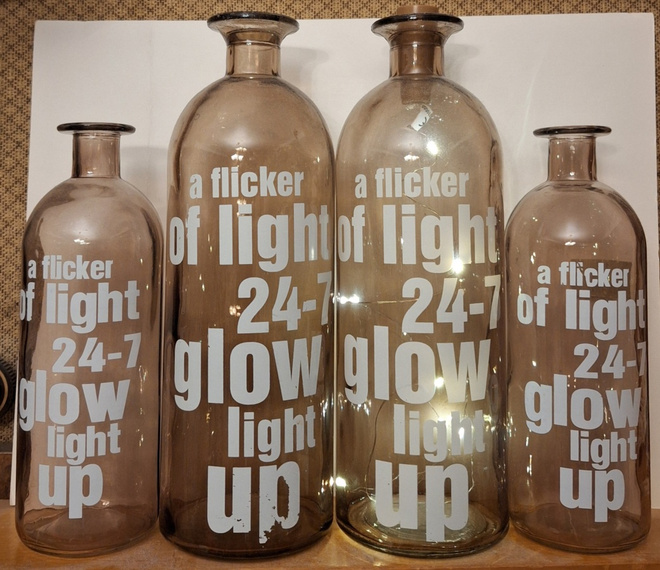 Koristepulloja a flicker of light 24-7 glow light up