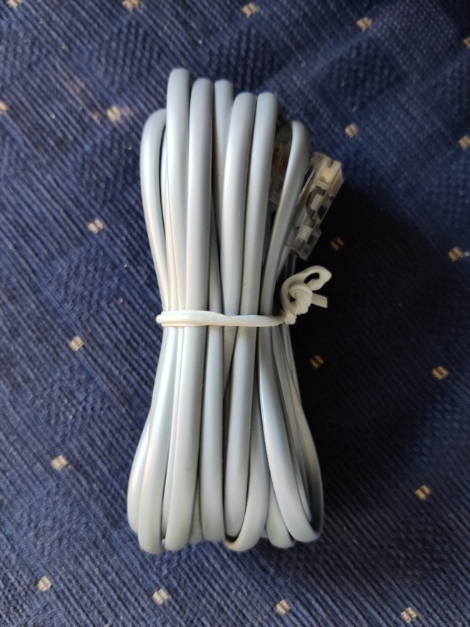 Puhelinkaapeli, noin 4 m, RJ-45/RJ-11