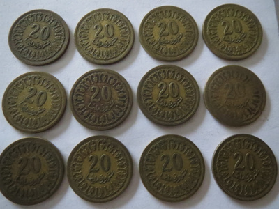 Tunisia kaksitoista 20 millim -kolikkoa1960