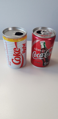 Pieni sievä Coca cola tölkki 2 kpl, 1,5 dl, kork. n 8,8 cm