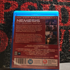Nemesis - pikkukuva 2