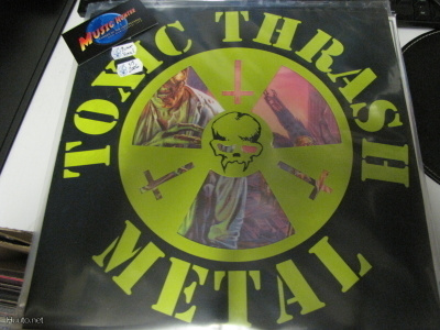 TOXIC HOLOCAUST-HELL ON EARTH LP KUVALEVY '06 JENKKI PAINOS