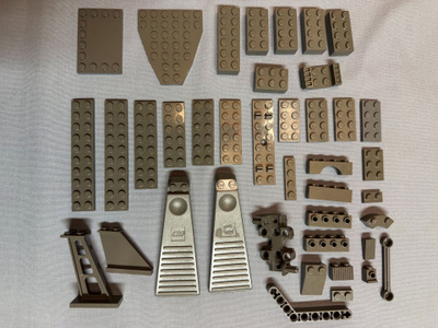 Tummanharmaita legopaloja
