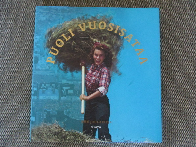 PUOLI VUOSISATAA - MMM JUHLAKIRJA (uusi)