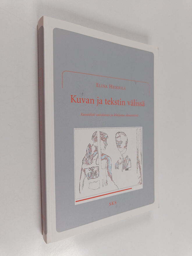 Elina Heikkilä : Kuvan ja tekstin välissä : kuvateksti uu...