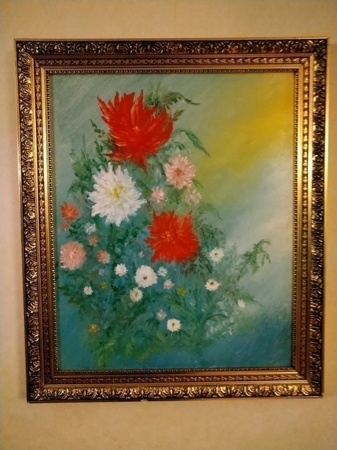 Kukkataulu kultakehyksillä. E. Yugria