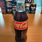 2002 valmistettu täysi Coca-Cola pullo (24v) - pikkukuva 1