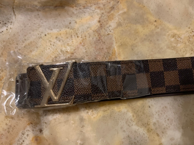 belt with letters L V