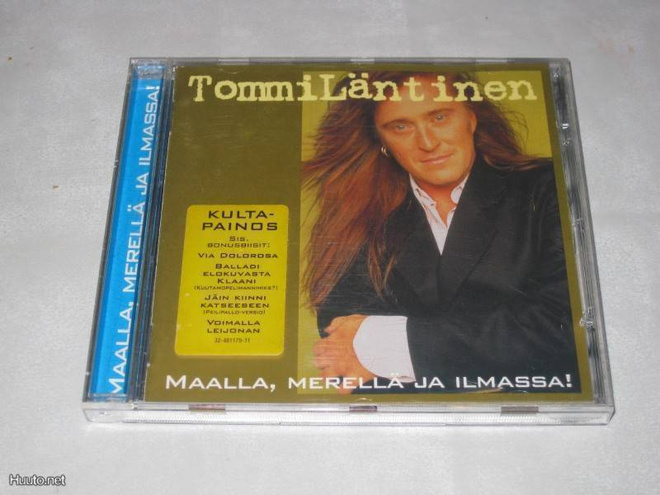 Tommi Läntinen : Maalla, merellä ja ilmassa (kultapainos)