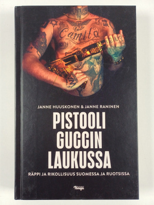 Janne Huuskonen ym. : Pistooli Guccin laukussa
