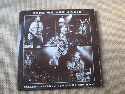 Guitar Slingers: Here We Are Again CDS