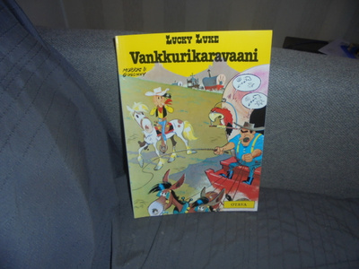 Sarjakuva albumi. Lucky Luke Vankkurikaravaani