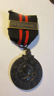 Talvisodan muistomitali KOTIJOUKOT-soljella