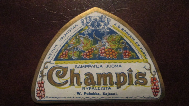 VANHA JUOMAETIKETTI - CHAMPIS W.PUHAKKA KAJAANI (AB1)