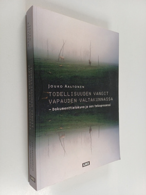 Jouko Aaltonen : Todellisuuden vangit vapauden valtakunna...