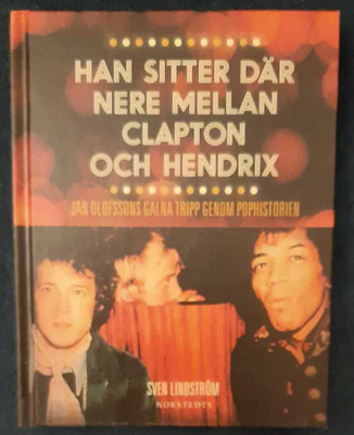 Han Sitter Där Nere Mellan Clapton och Hendrix