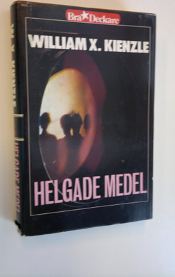 William X. Kienzle : Helgade Medel