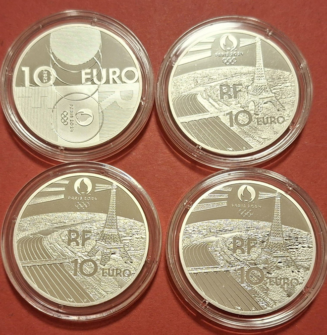4 x Paris Olympics 999 hopea rahoja. Yhteispaino 88 g. (KD7)