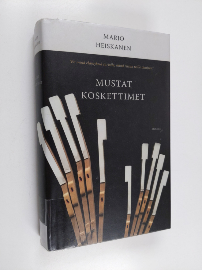 Marjo Heiskanen : Mustat koskettimet