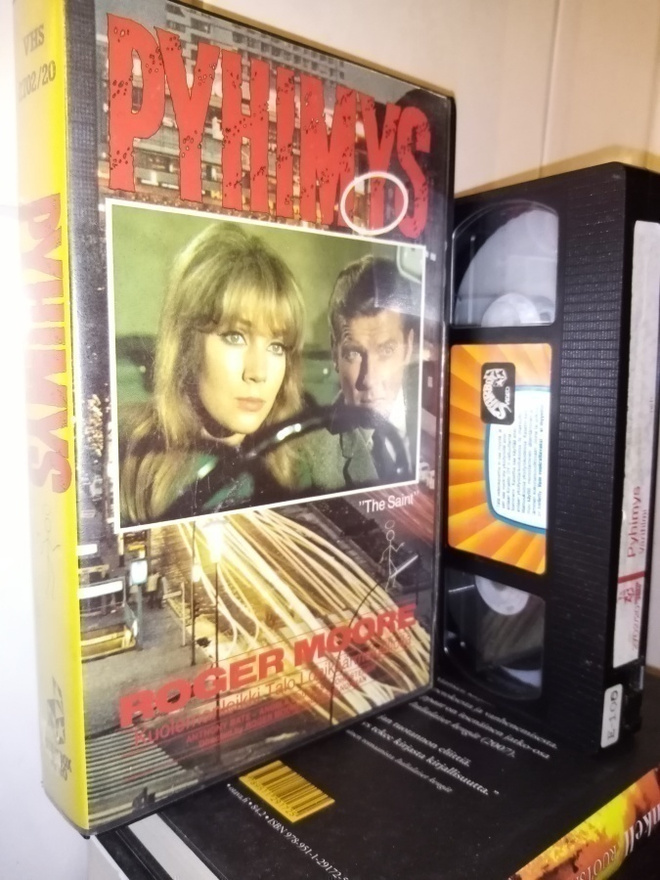 VHS  :  PYHIMYS (  ROGER MOORE ) SIS POSTIKULU