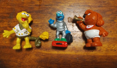 Fragglit ja muppets figuurit. Jim henson