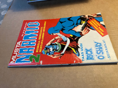 MUSTANAAMIO 12/1974