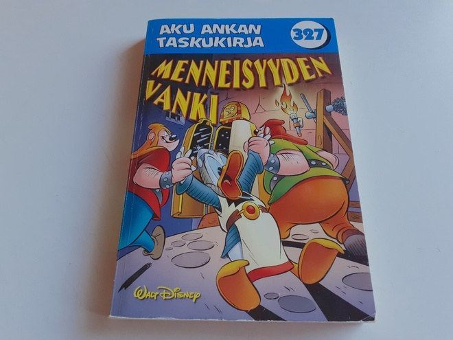 Aku Ankan taskukirja 327 Menneisyyden vanki